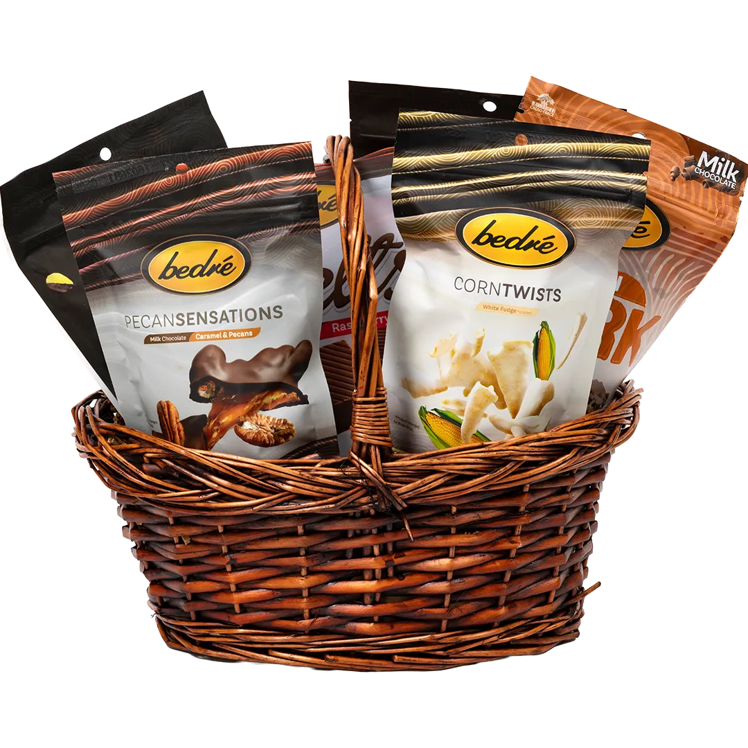 Bedré Executive Delight gift basket with dark chocolate sauce, chocolate melts, and assorted gourmet snacks