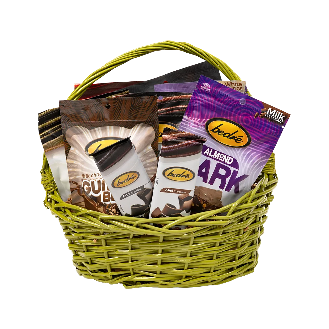 Small jewel-tone green gift basket with assorted Bedré chocolate bars and treats