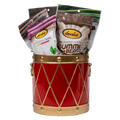 Bedré Fine Chocolate red and gold Christmas Drum tin (medium), filled with Pecan Sensations, Pistachio Cranberry Bark, and Milk Chocolate Dipped Potato Chips pouches