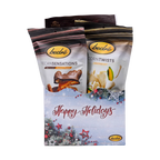 Bedré Fine Chocolate Happy Holidays Tinsel Star Gift Box with red star ornaments, Pecan Sensations and Corn Twists pouches