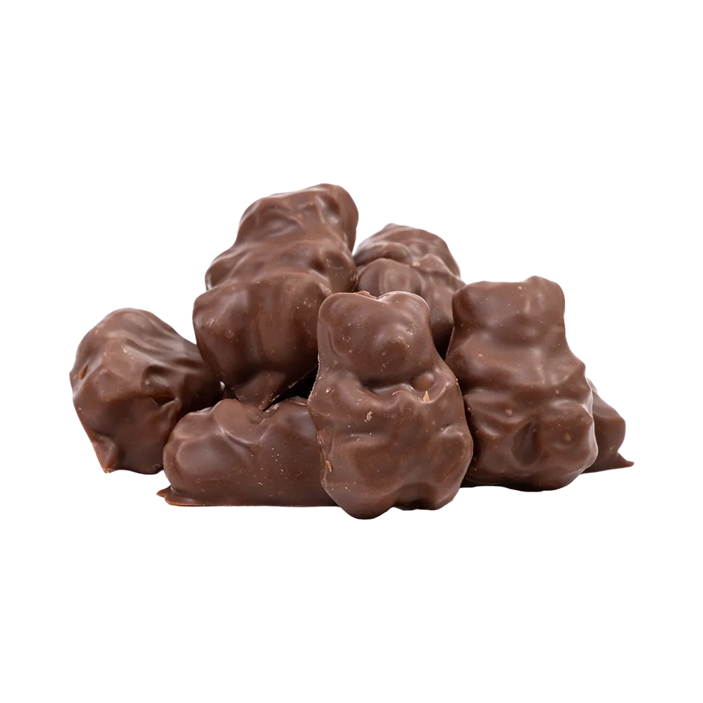 Bedré Fine Chocolate milk chocolate-covered gummi bears piled outside the bag