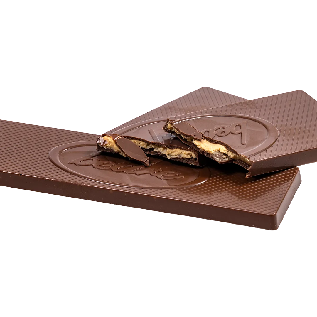 Unwrapped Bedré Fine Chocolate Milk Chocolate Peanut Butter Bar showing filling