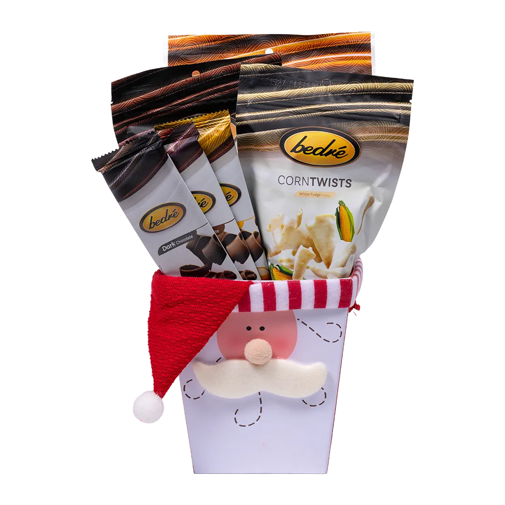 Bedré Fine Chocolate Santa's Favorites Box, paperboard container with knit Santa hat, holding chocolate bars and Corn Twists