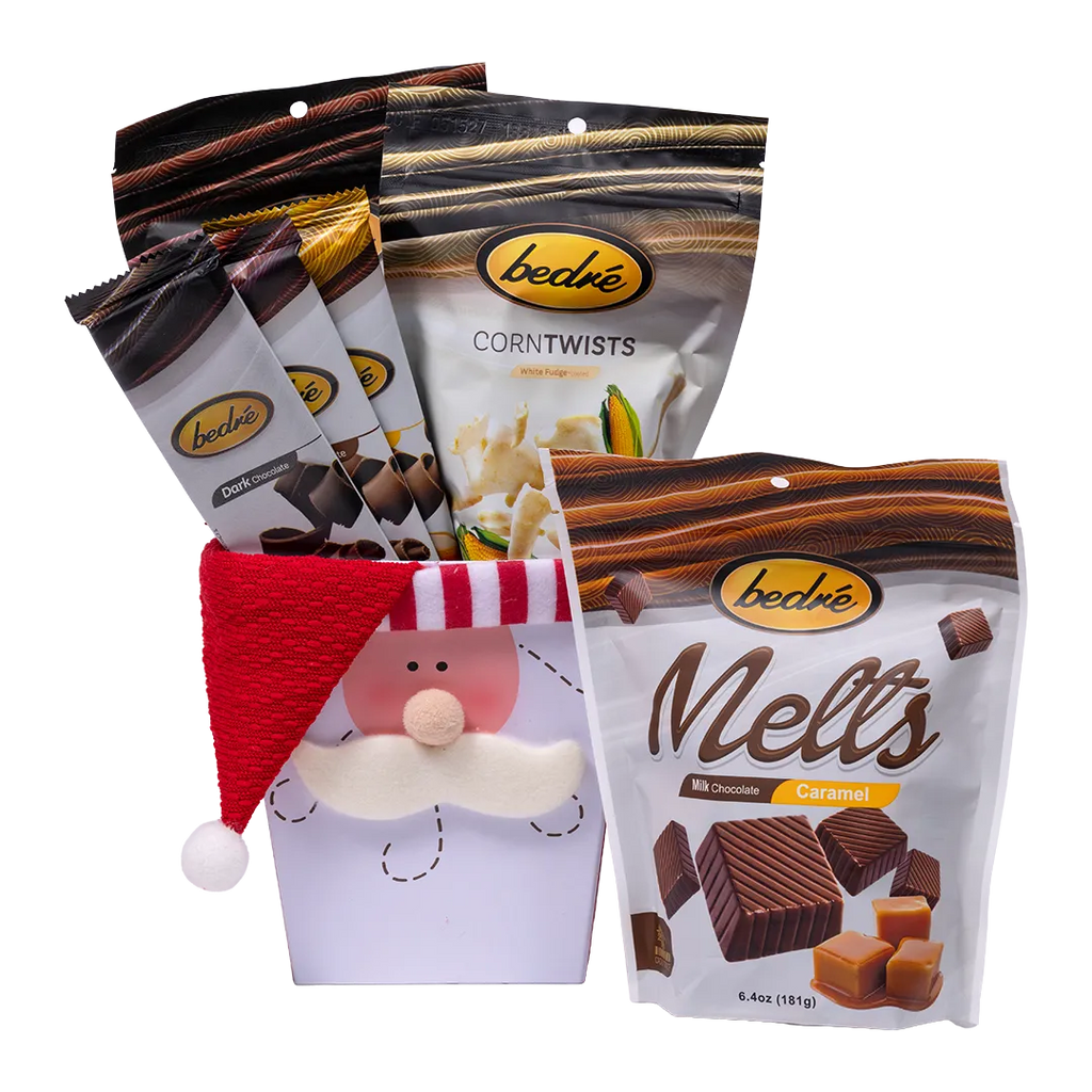 Bedré Fine Chocolate Santa's Favorites Box styled with Milk Chocolate Caramel Melts, Corn Twists, and assorted chocolate bars