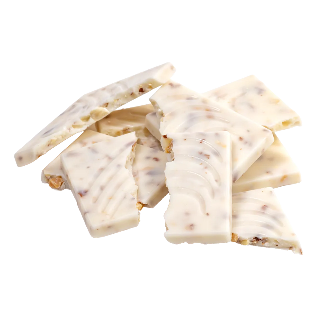 Bedré Fine Chocolate White Fudge Almond Bark pieces broken out of packaging
